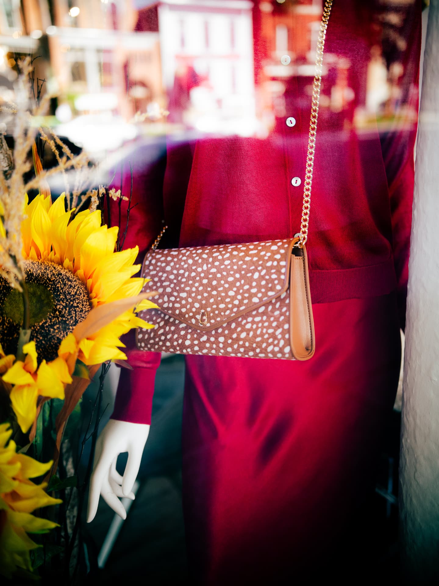 Signature Horsehair Clutch in fawn worn crossbody at Violet's of Saratoga
